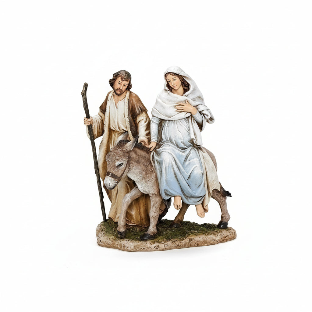 A statue of the Holy Family, featuring figures of Mary and Joseph, mounted on a donkey.