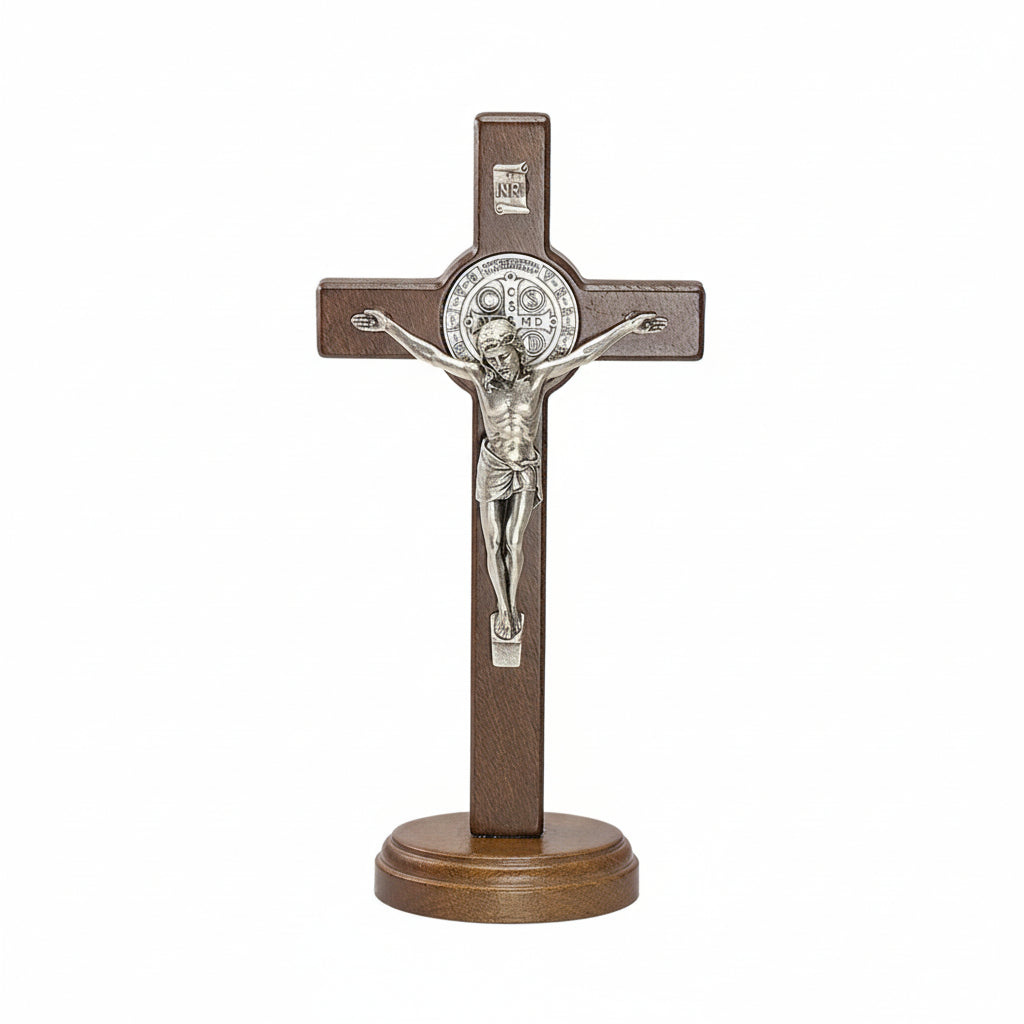 Wooden crucifix with silver Jesus figure on a white background