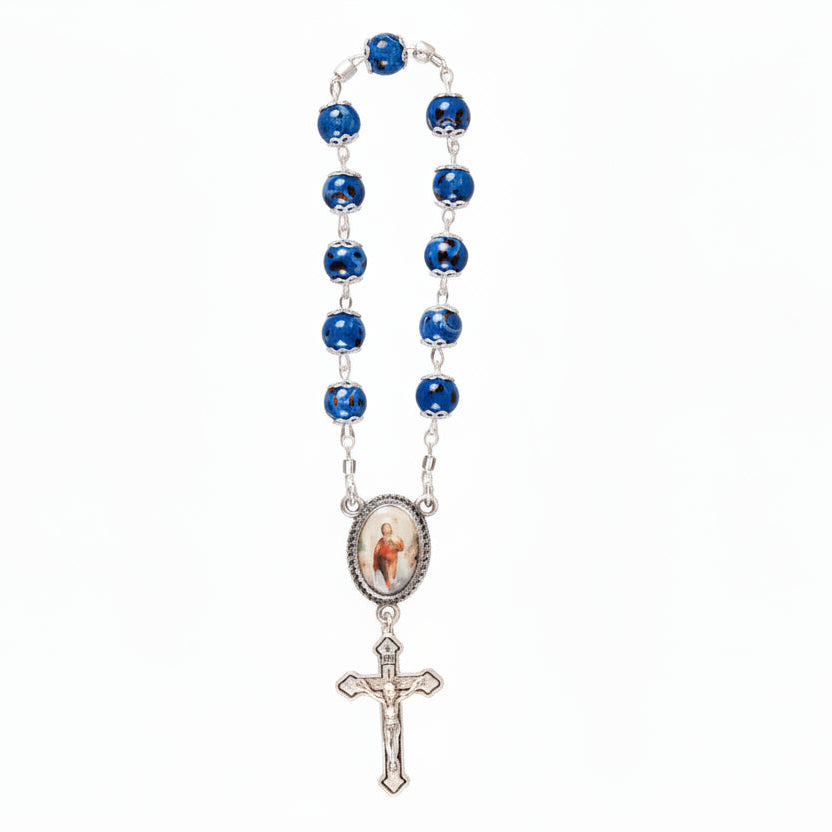 A blue two-tone car rosary with a cross and round beads, displayed against a white background