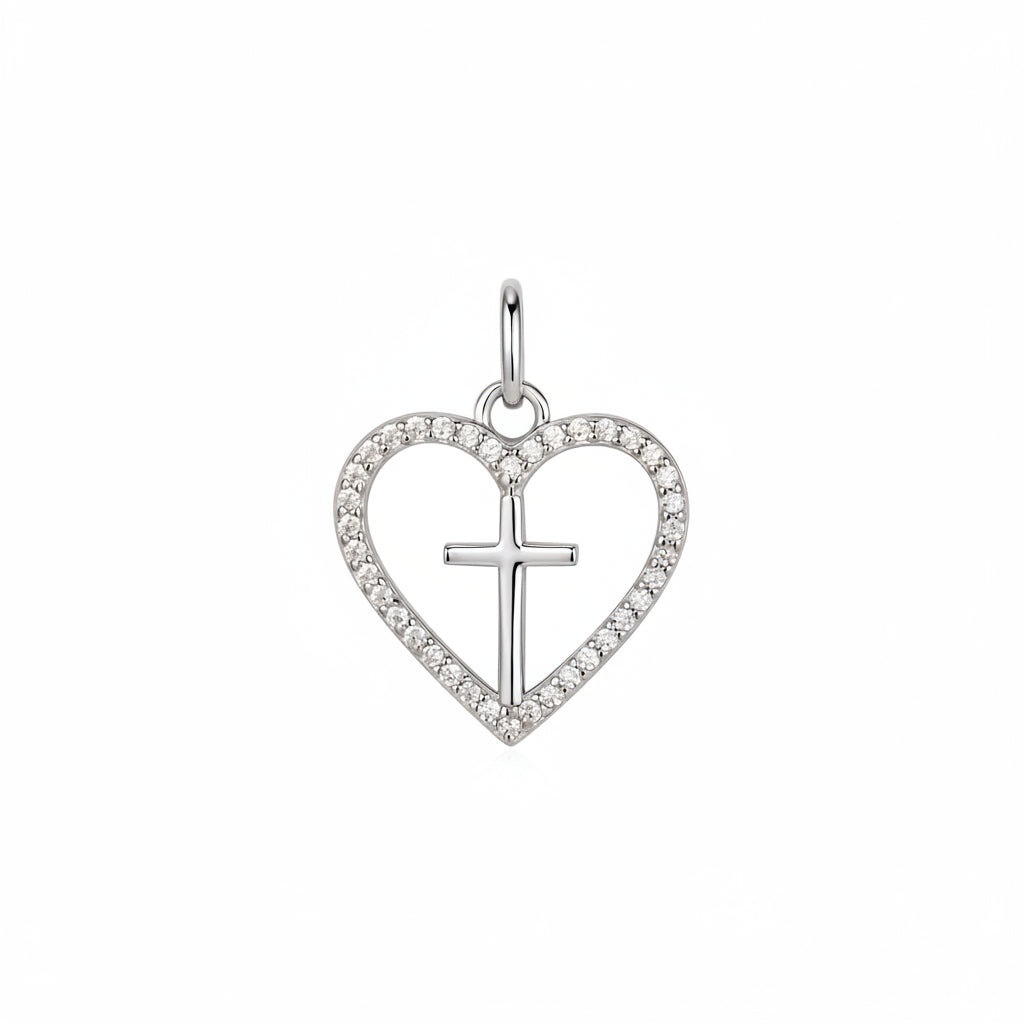 Silver heart-shaped pendant with a cross in the center on a white background
