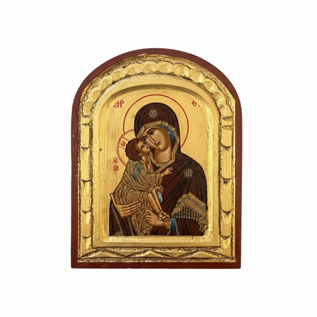 Icon of a religious figure holding a child within a decorative frame.