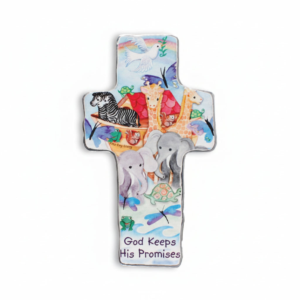 A metal art cross featuring illustrations of animals and the phrase 'God keeps His promises'.