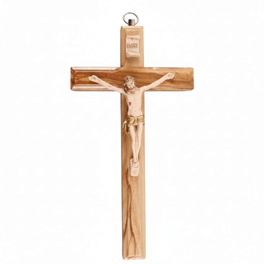 Wooden crucifix with Jesus Christ figure on a white background
