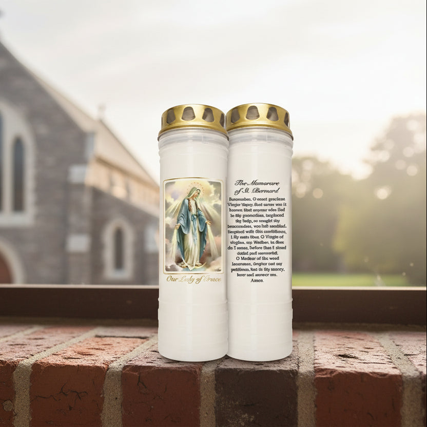 Two prayer candles with our lady og grace on a white background