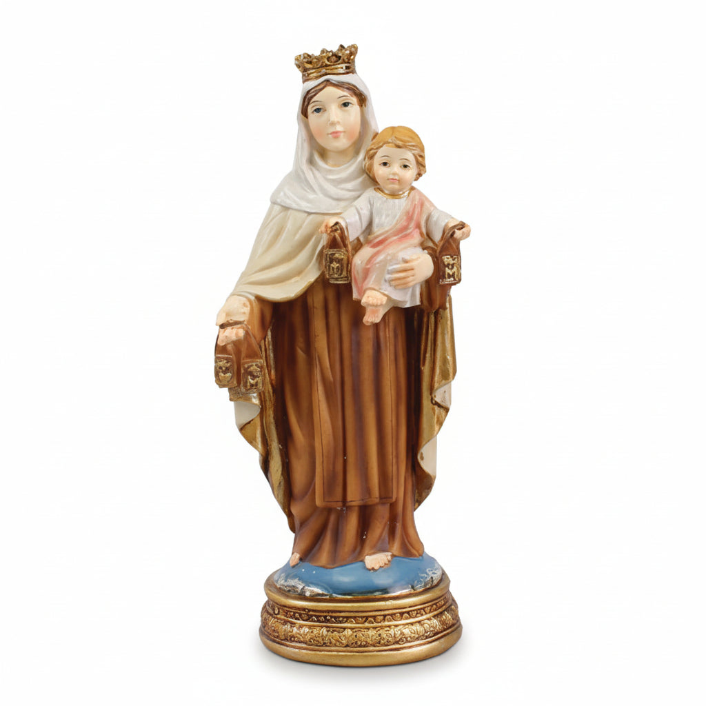 A statue of Our Lady of Mount Carmel, depicting the Virgin Mary holding a baby, with a gold-colored crown and brown robes against a white background.