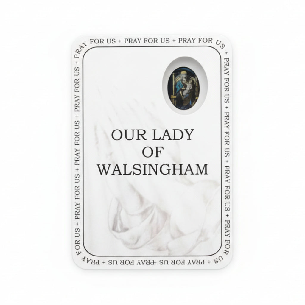 Card featuring 'Our Lady of Walsingham' with prayer text on a wooden surface