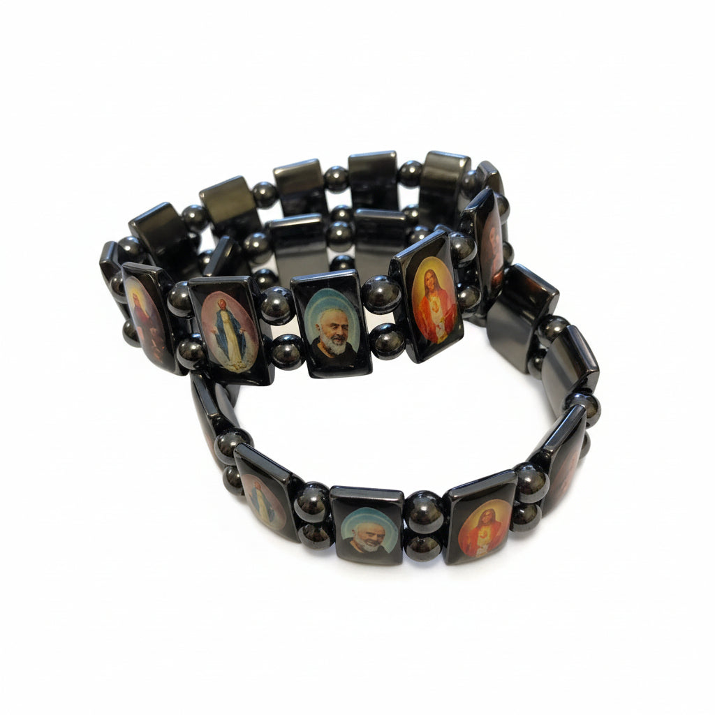 Bracelet with portrait beads on a white surface with a keyboard in the background
