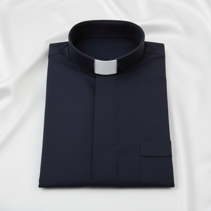 A long sleeve black clergy shirt with a collar, made of polyester and cotton blend, flat laid on a white background.