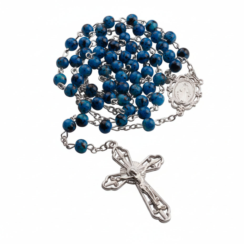 Blue rosary with silver cross and medal on a white background