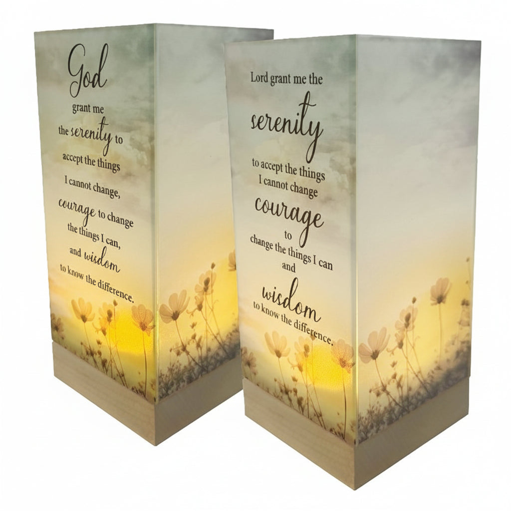 Luminous lantern with 'Serenity Prayer' text and floral design on a white background