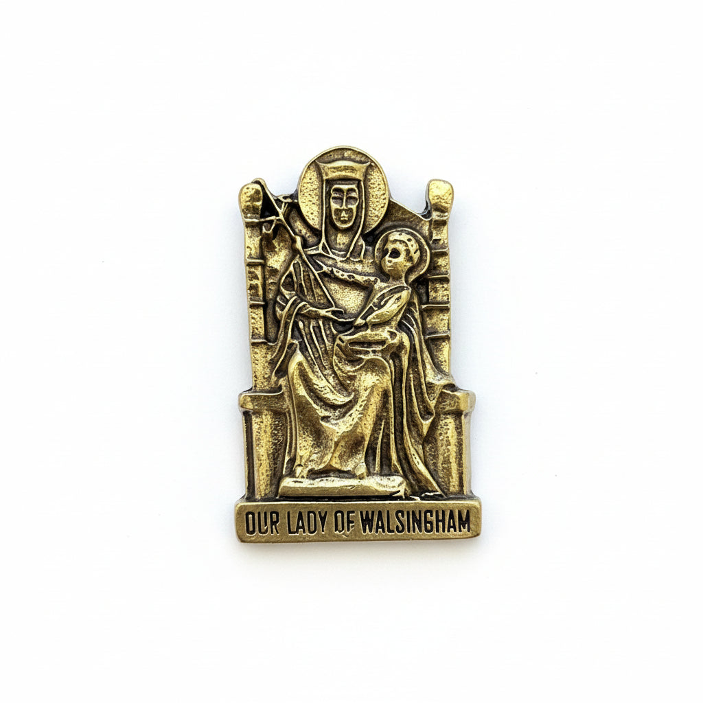 Gold statue of Our Lady of Walsingham on a white background