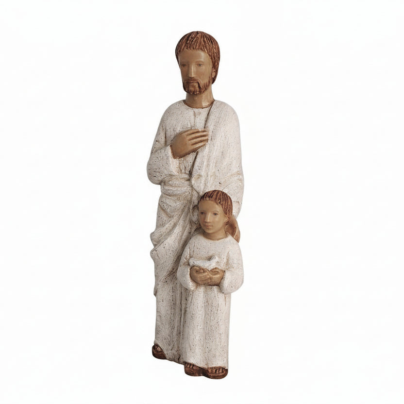 Statue of a man and a child holding hands on a white background
