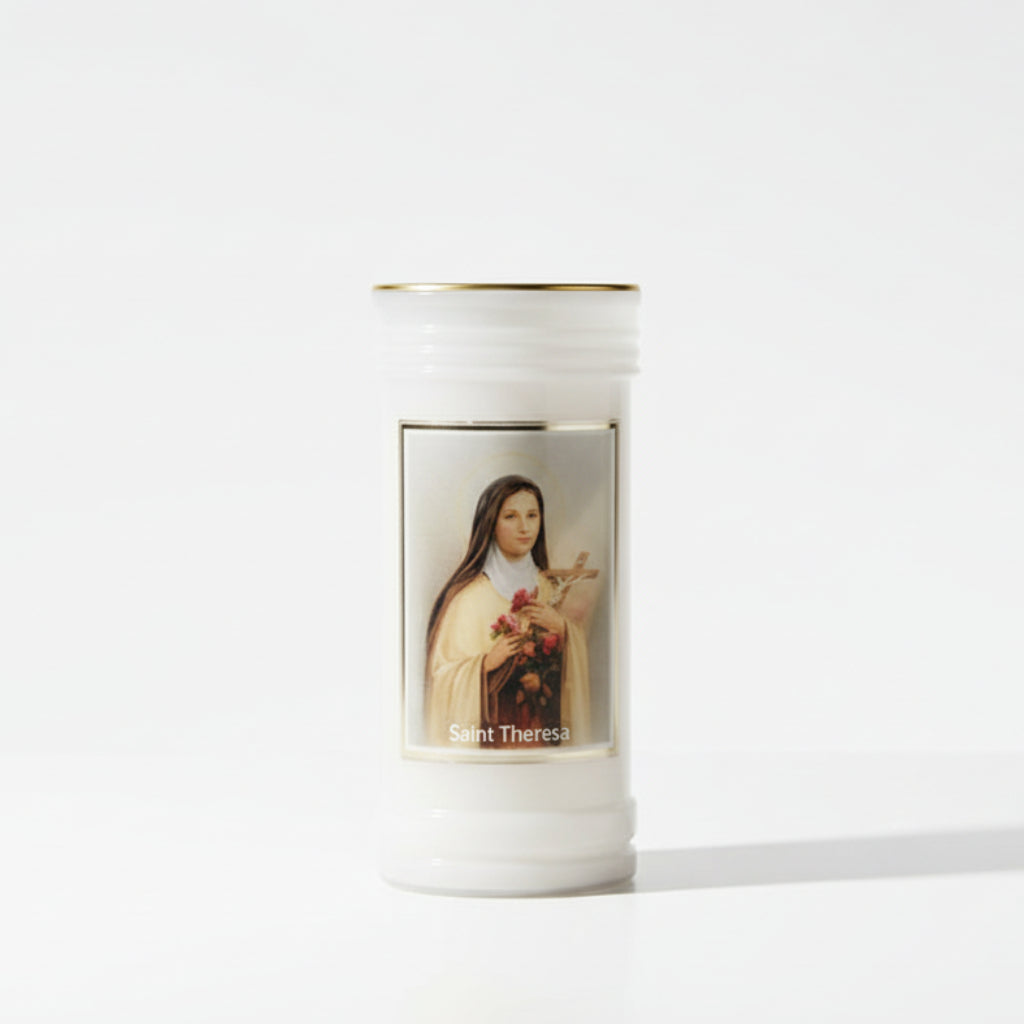 Candle with a religious icon of a woman on a white background