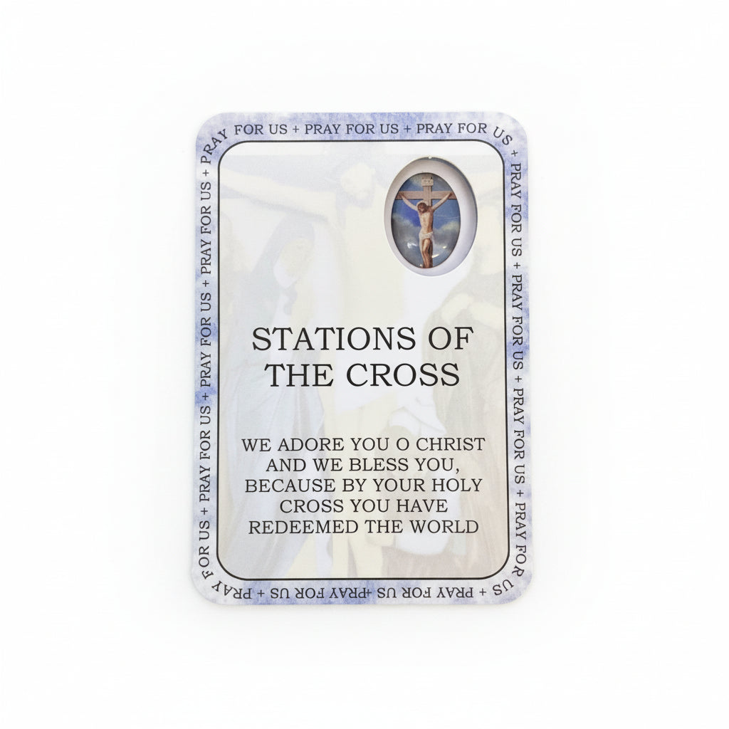 Card titled 'Stations of the Cross' on a wooden surface