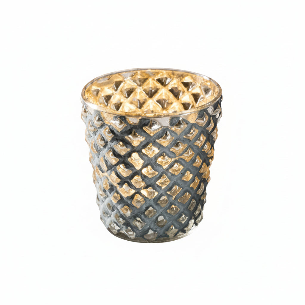 Decorative glass candle holder with geometric pattern on a gray background