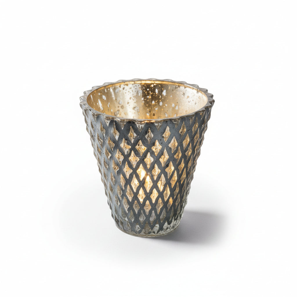 Decorative glass container with gold interior and lattice pattern exterior on a gray background