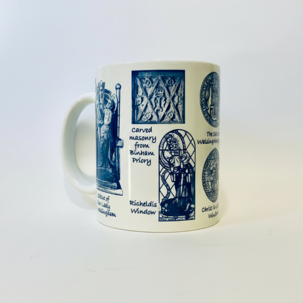 Mug with blue designs and text on a white background
