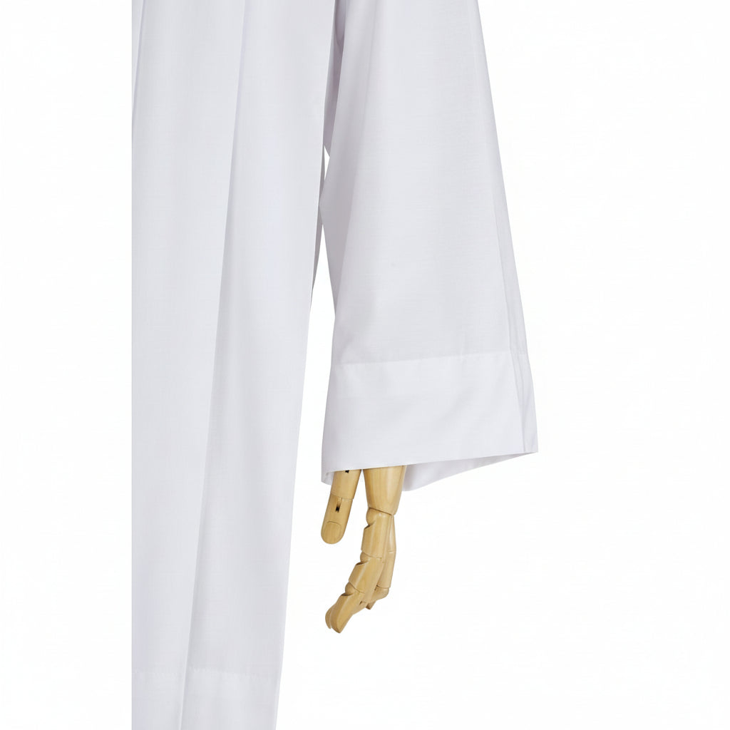 White coat on a wooden mannequin against a plain background