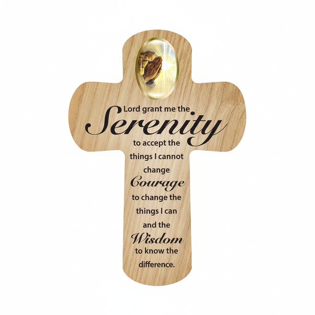 Wooden cross with engraved Serenity prayer on a white background