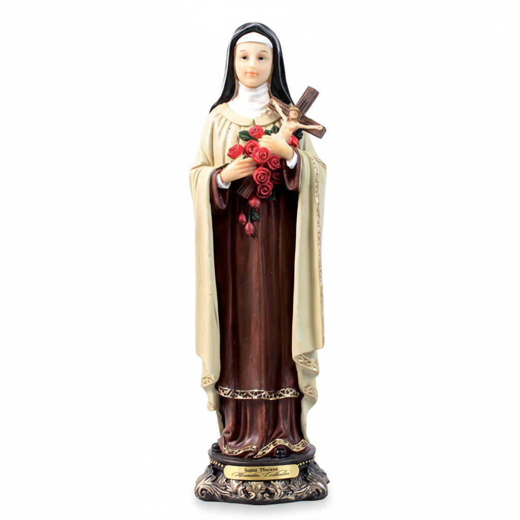 Statue of a religious figure of saint theresa holding flowers and a cross on a white background