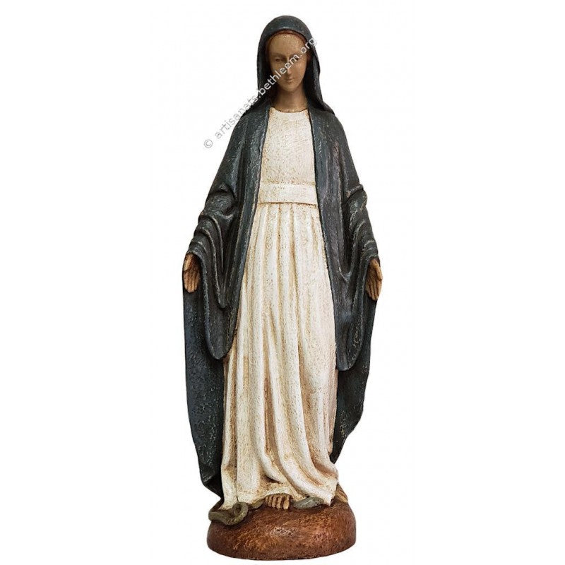 A statue of Notre Dame de la Rue de Bac, depicting a figure in a white dress with a gray shawl standing on a brown base.